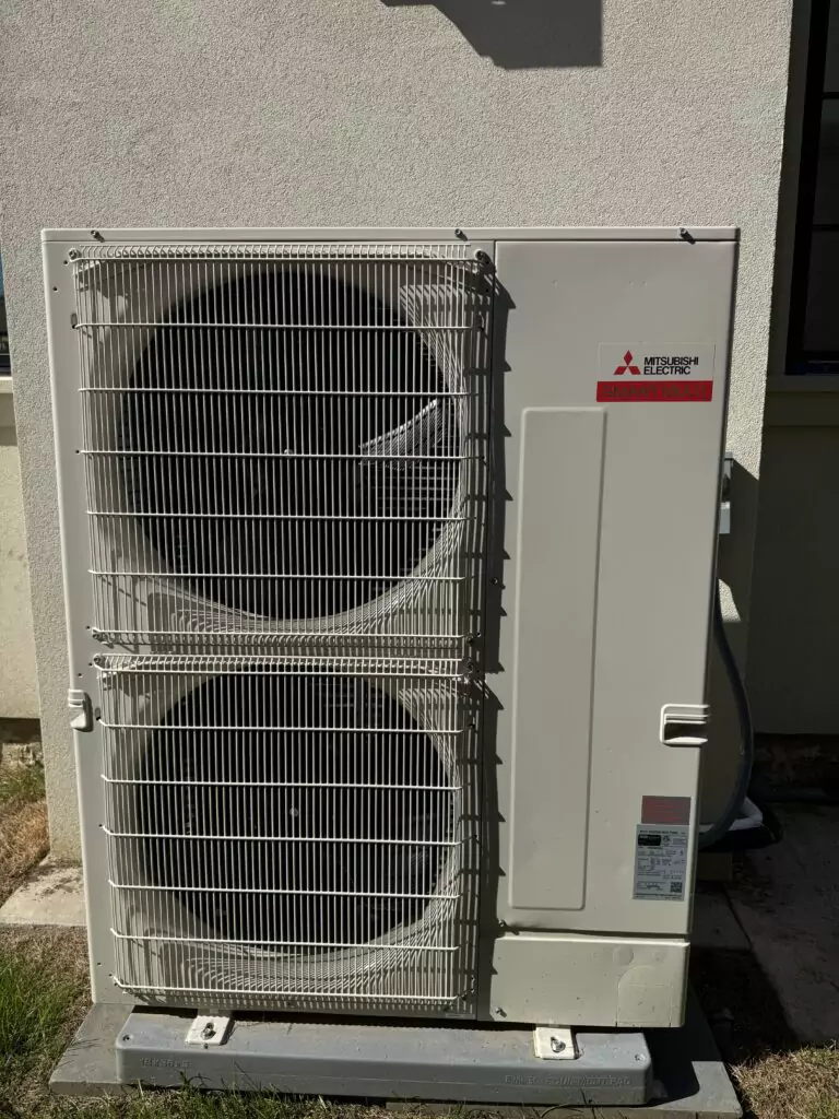 An efficient HVAC unit outside a home