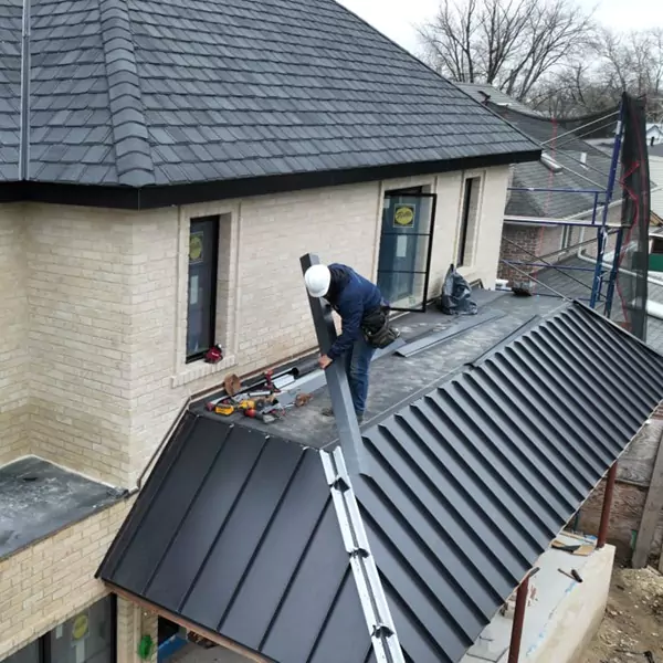 REVMA roofing professional at work