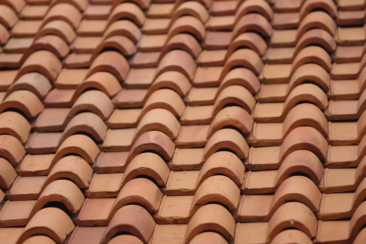 A close-up of authentic clay Spanish tiles on a luxury home