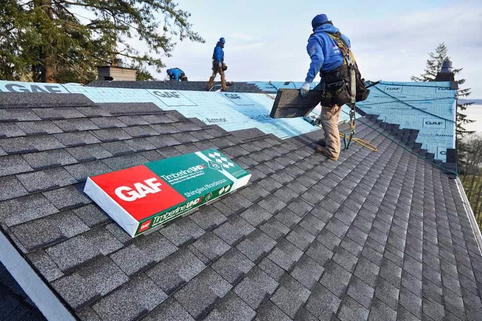 Architectural shingles being installed on a home in Whitestone, Queens