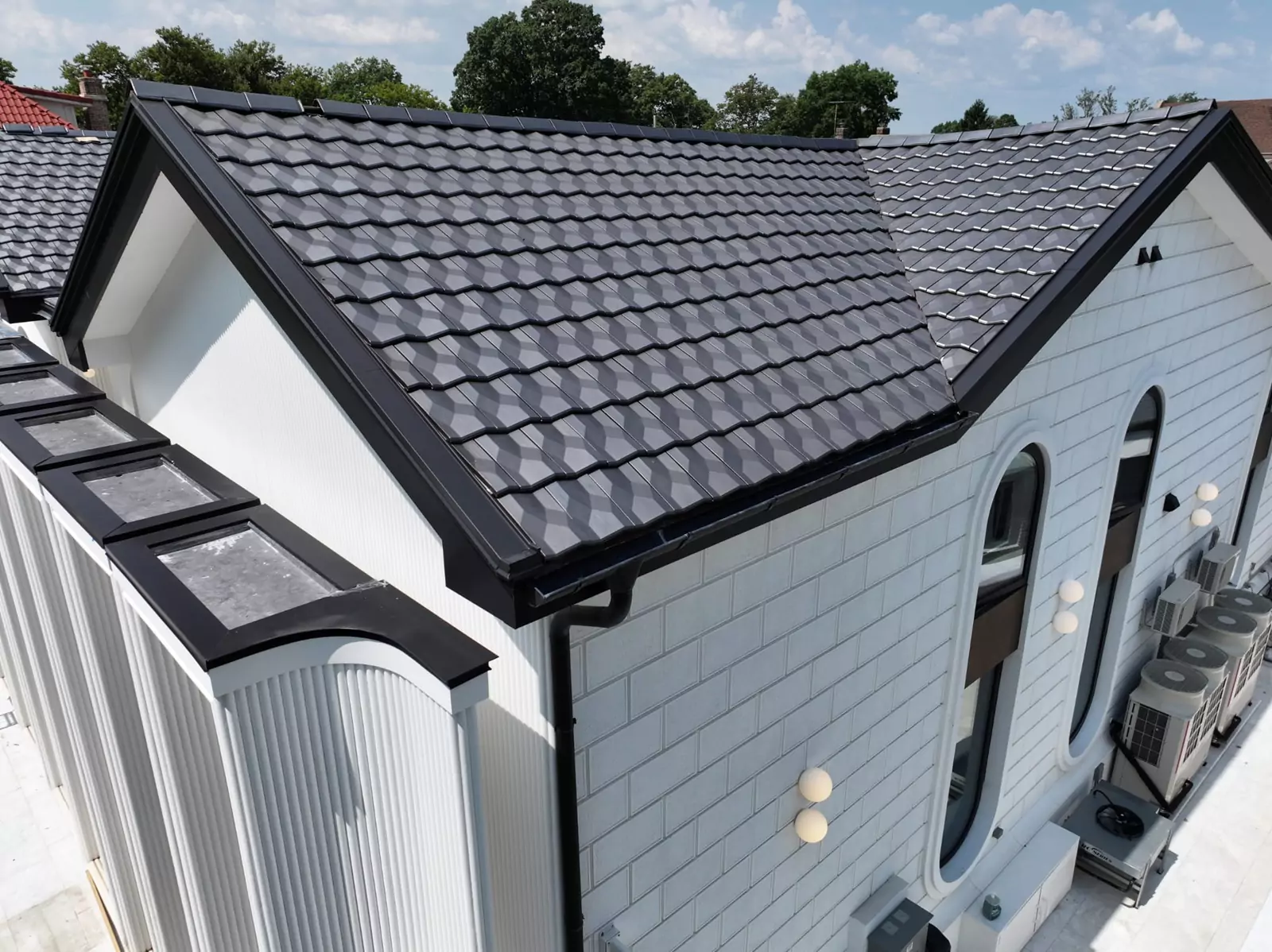 A modern home with a newly installed slate roof