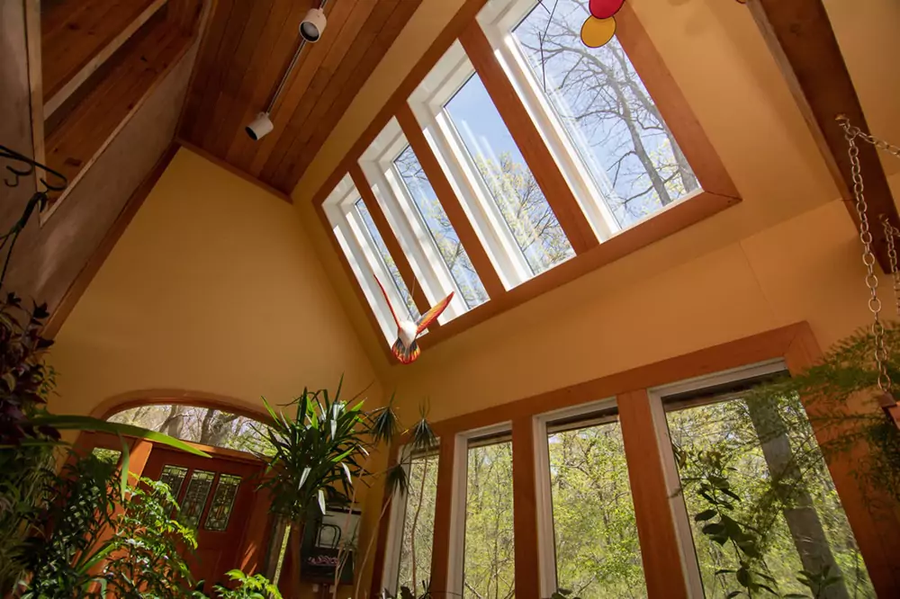 Bright living room filled with natural light from new supreme skylights