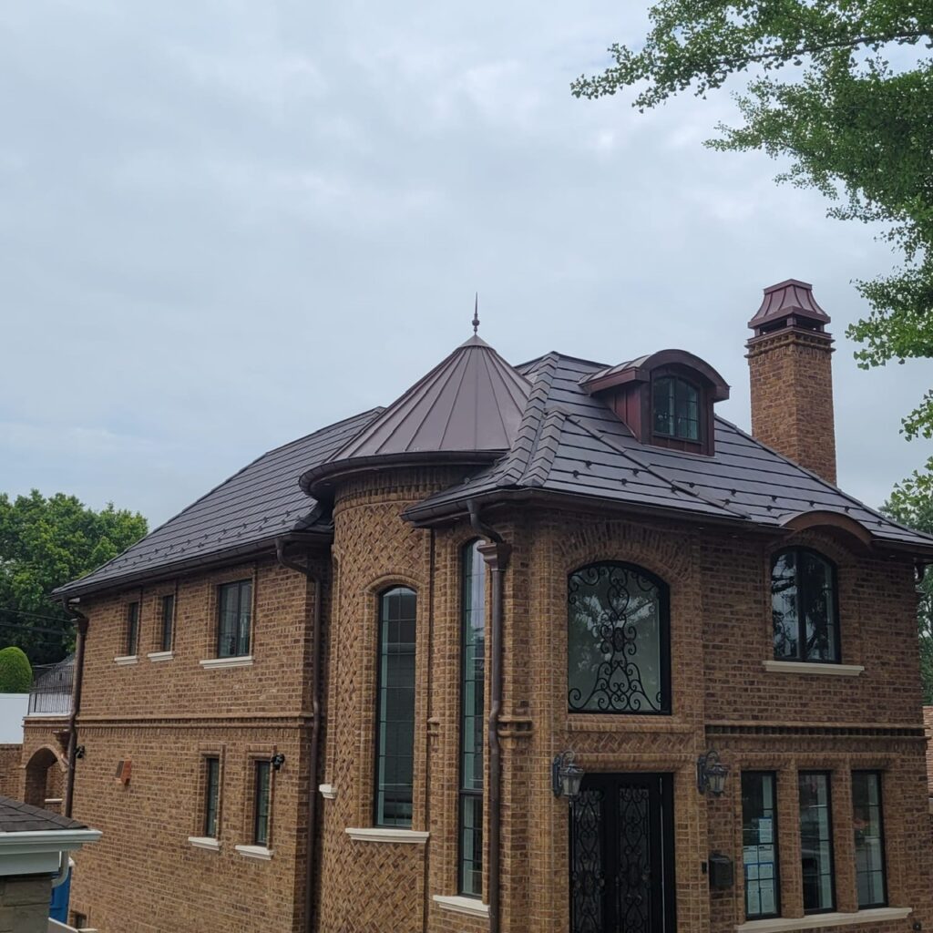 composite slate roof installation with copper